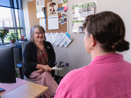 CHAS Health PRC helping a patient