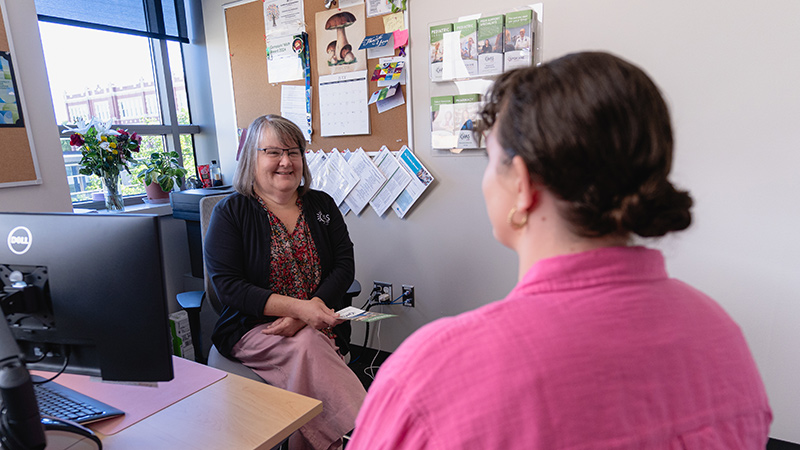 CHAS Health PRC helping a patient