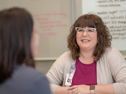 CHAS Health patient resource specialist talking to patient