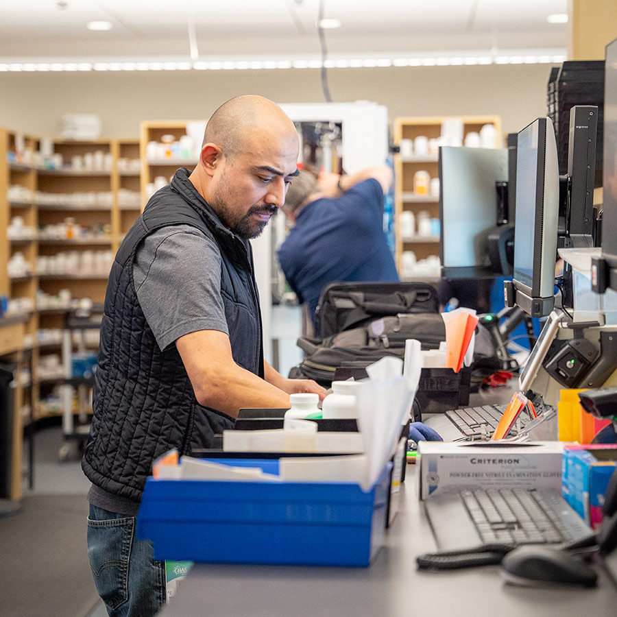CHAS Health Centralized Pharmacy worker