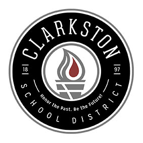 Clarkston School District circular logo featuring a black outer ring with white text, a central torch icon with a flame in red and gray, and the words “Clarkston School District” along with the phrase “Honor the Past. Be the Future.”